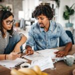 multi-ethnic-couple-planning-their-home-budget-1216679280-9c5d6f035994485595a73a53c0d5b258
